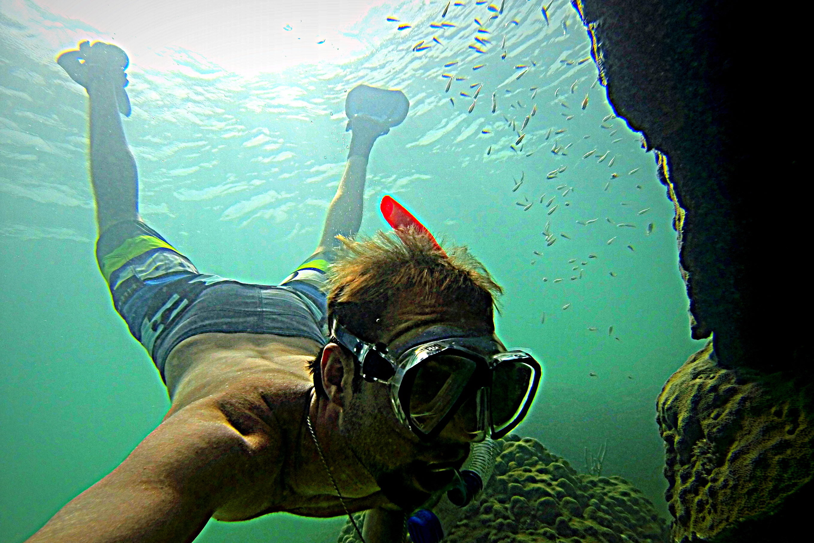 Here is a underwater shot of captain nick snorkeling a coral formation off of key west.