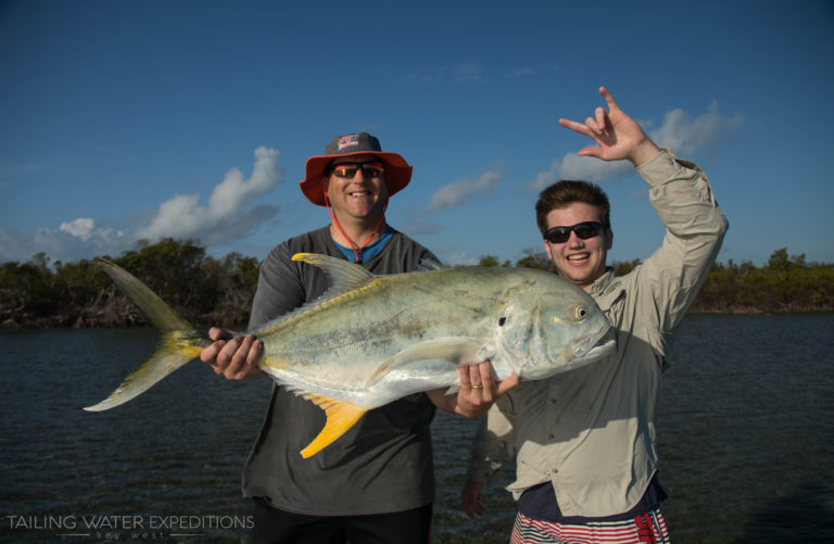 These anglers hold up a monster Jack Crevalle they caught in the backcountry off of Key West