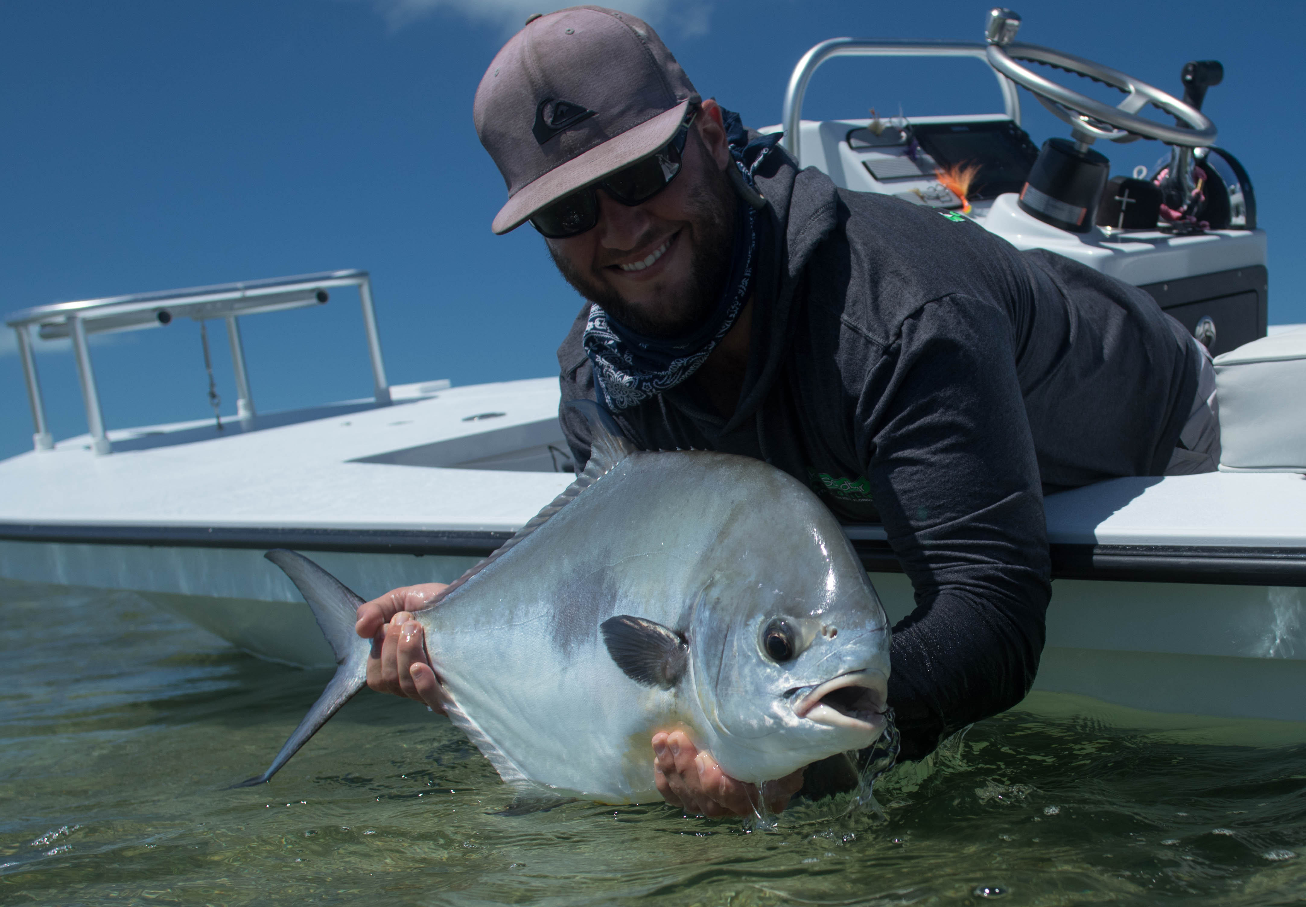 Taylor is holding a nice permit he caught while sight fishing in the Florida Keys