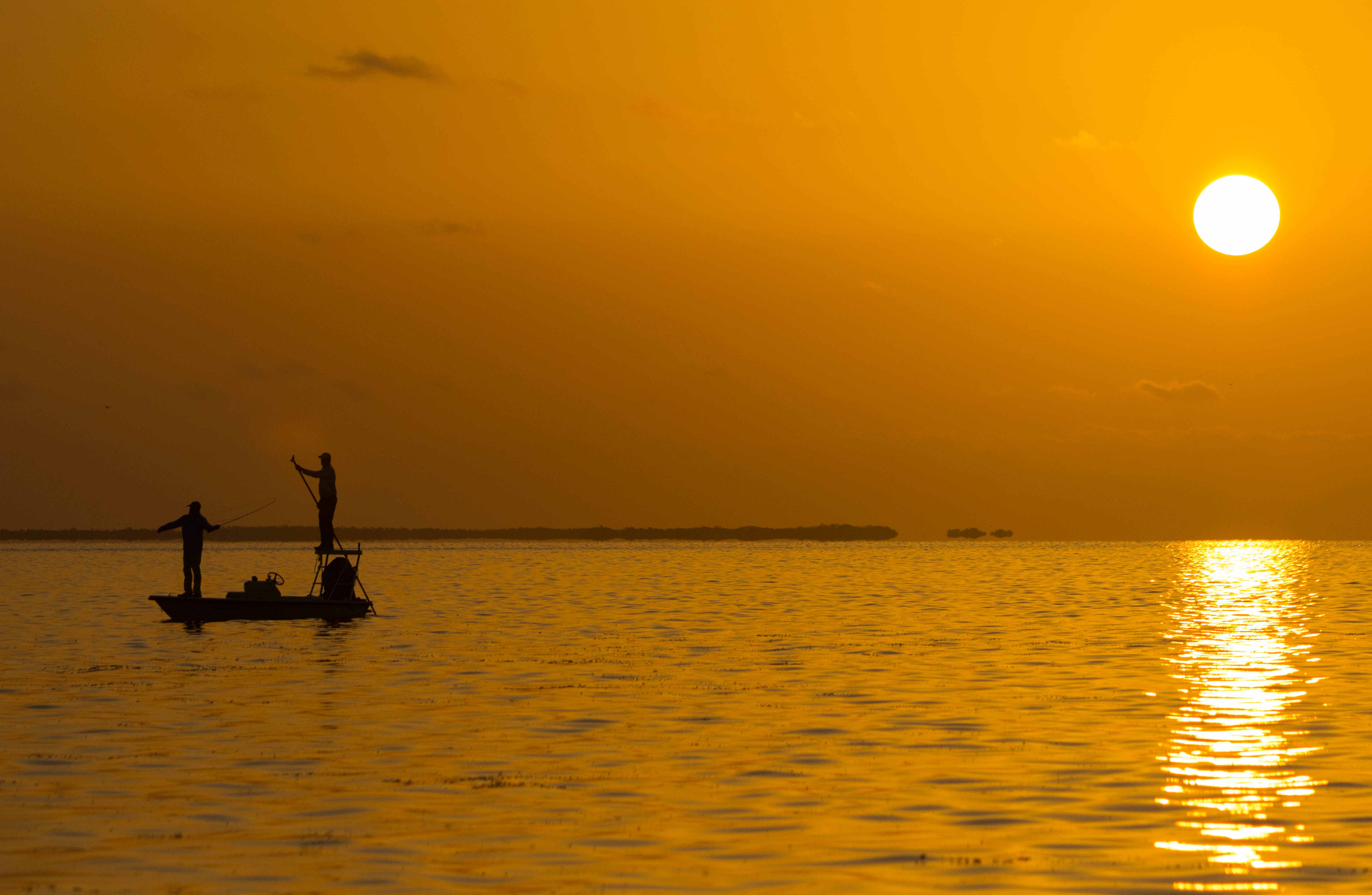 Poling skiff on the flats of Key West looking for tarpon